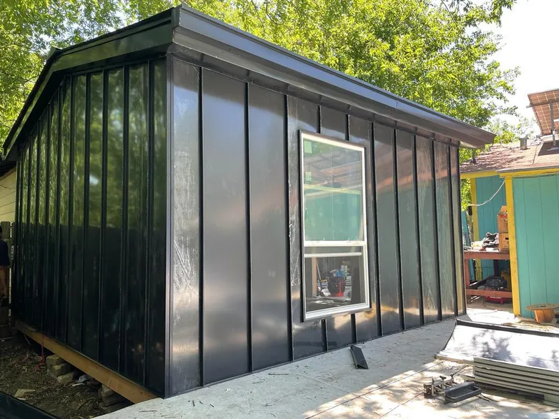 Black standing seam metal wall panels for Roof Inspection in Eagle